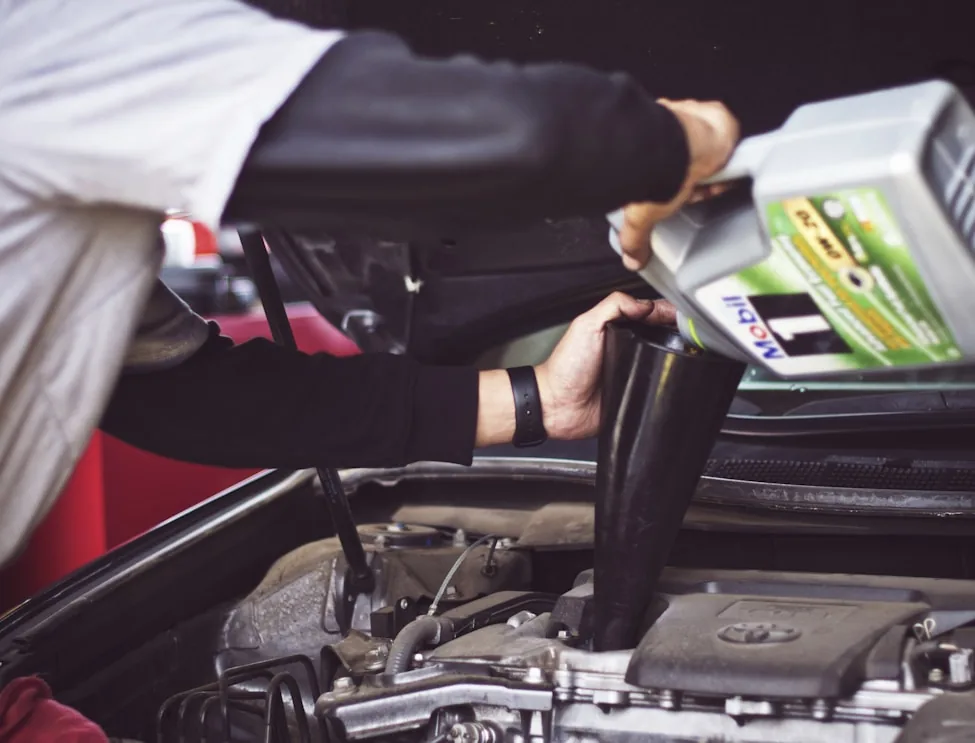 Mechanic servicing a car